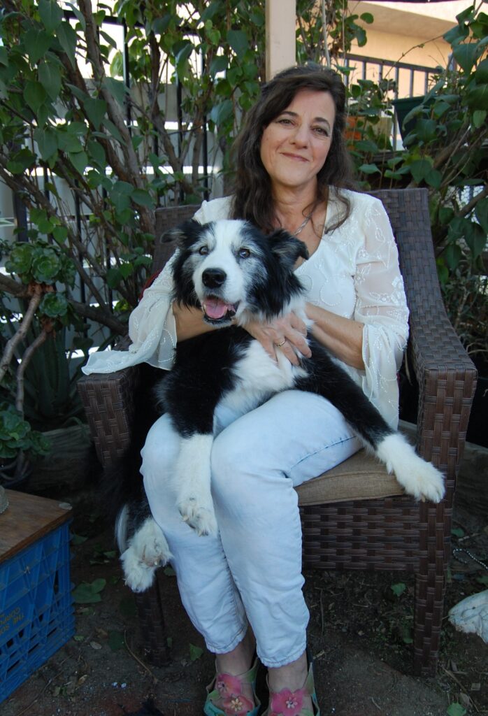 Image of Writer Pat Kramer with her dog, Mr. Blue